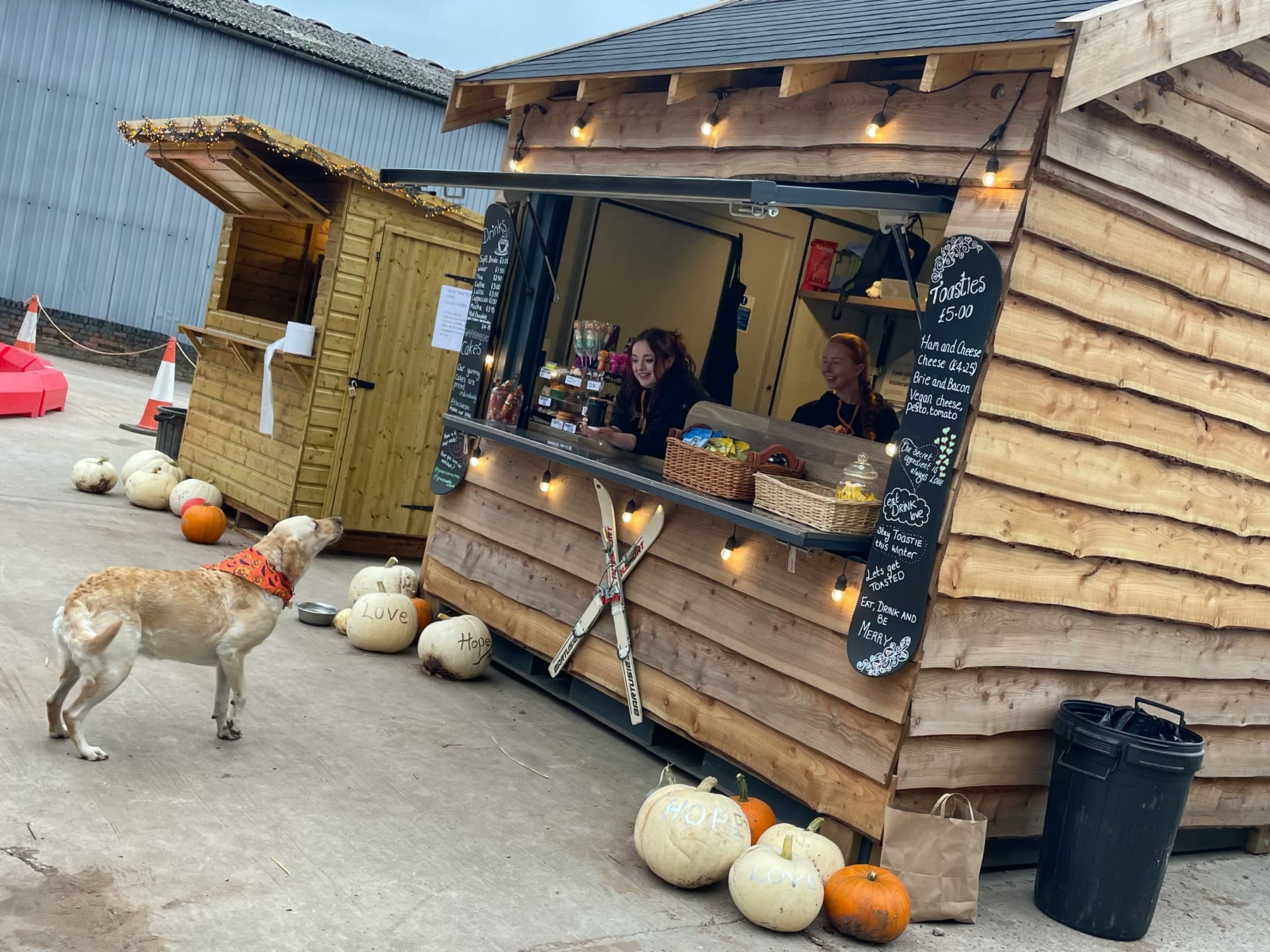 The Rymans food cabin serving hatch with toasties and drinks menus